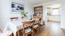 The kitchen and dining-room where everyone can sit and chat.