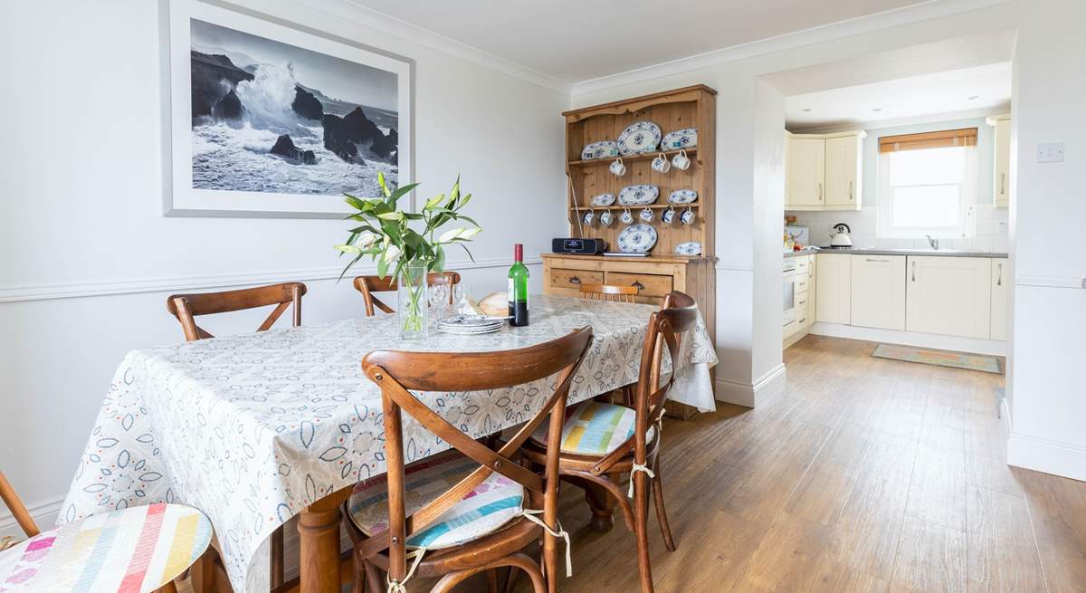 The kitchen and dining-room where everyone can sit and chat.