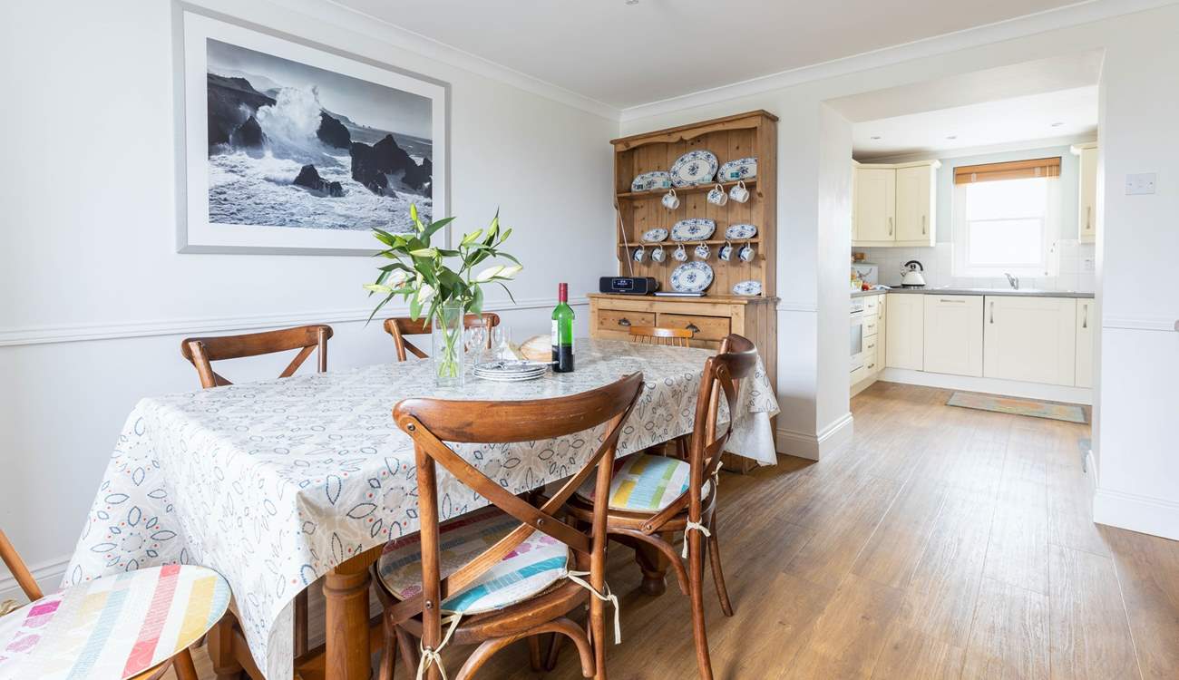 The kitchen and dining-room where everyone can sit and chat.