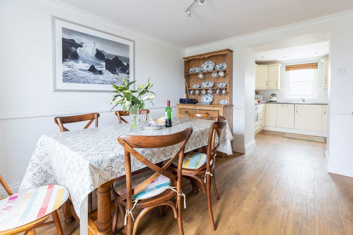 The kitchen and dining-room where everyone can sit and chat.