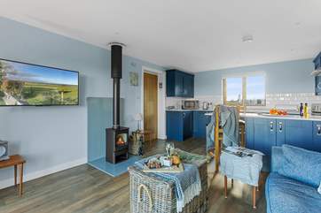After a day out exploring, sit back and relax in front of the wood-burner.
