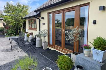Welcome to The Nest - you enter the property via the patio doors with the owners door being the green door.