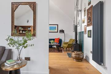 Step into the sitting-room - a cosy hideaway, ideal for relaxing.
