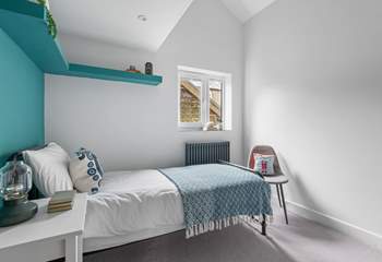 Bedroom Two is a lovely room with a cosy single bed and leads to a mezzanine level above.
