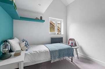Bedroom Two is a lovely room with a cosy single bed and leads to a mezzanine level above.