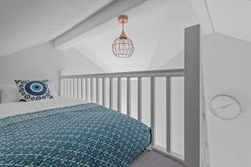 Mezzanine level accessed from Bedroom Two with a comfy single bed - a sweet little spot to hideaway!