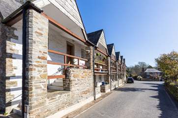 The village road offers the perfect arrival.