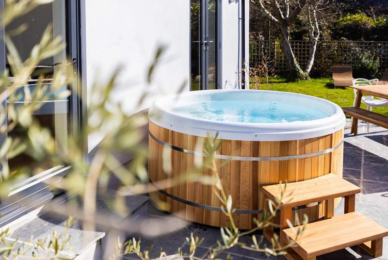 The hot tub sits in the front garden and offers the perfect spot to sit back and star gaze!
