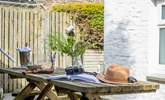 The sheltered terrace is the perfect spot to enjoy dining al fresco style . - Thumbnail Image