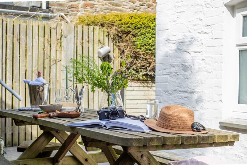 The sheltered terrace is the perfect spot to enjoy dining al fresco style .