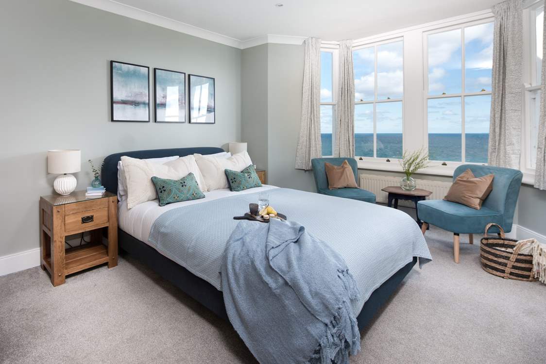 A comfy king-size awaits you in bedroom one.