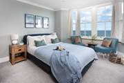 A comfy king-size awaits you in bedroom one.