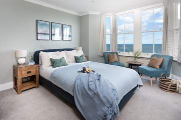 A comfy king-size awaits you in bedroom one.