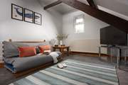 Teenagers can escape to the snug to enjoy some adult free time! (The futon is only to be used as a sofa and not as a bed)