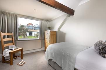 This lovely single room sits at the back of the house, looking out over the garden.
