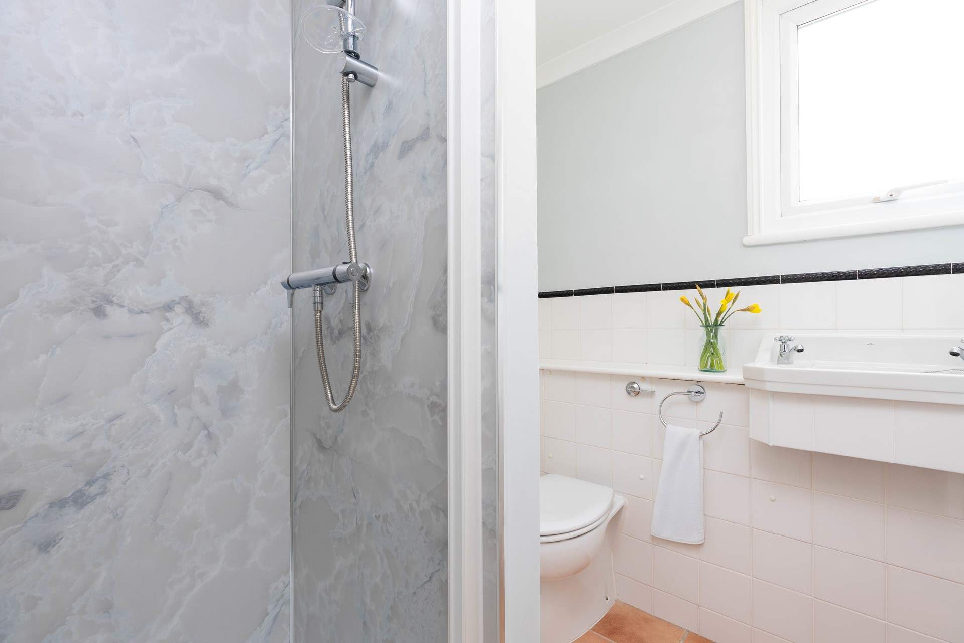 The family shower room on the first floor.
