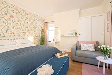 The bedroom is bright and spacious.