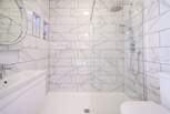 The sleek shower-room. 