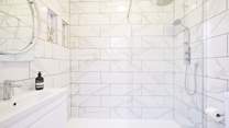The sleek shower-room. 