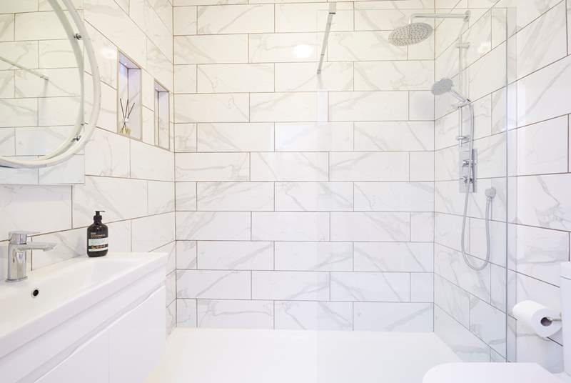 The sleek shower-room. 