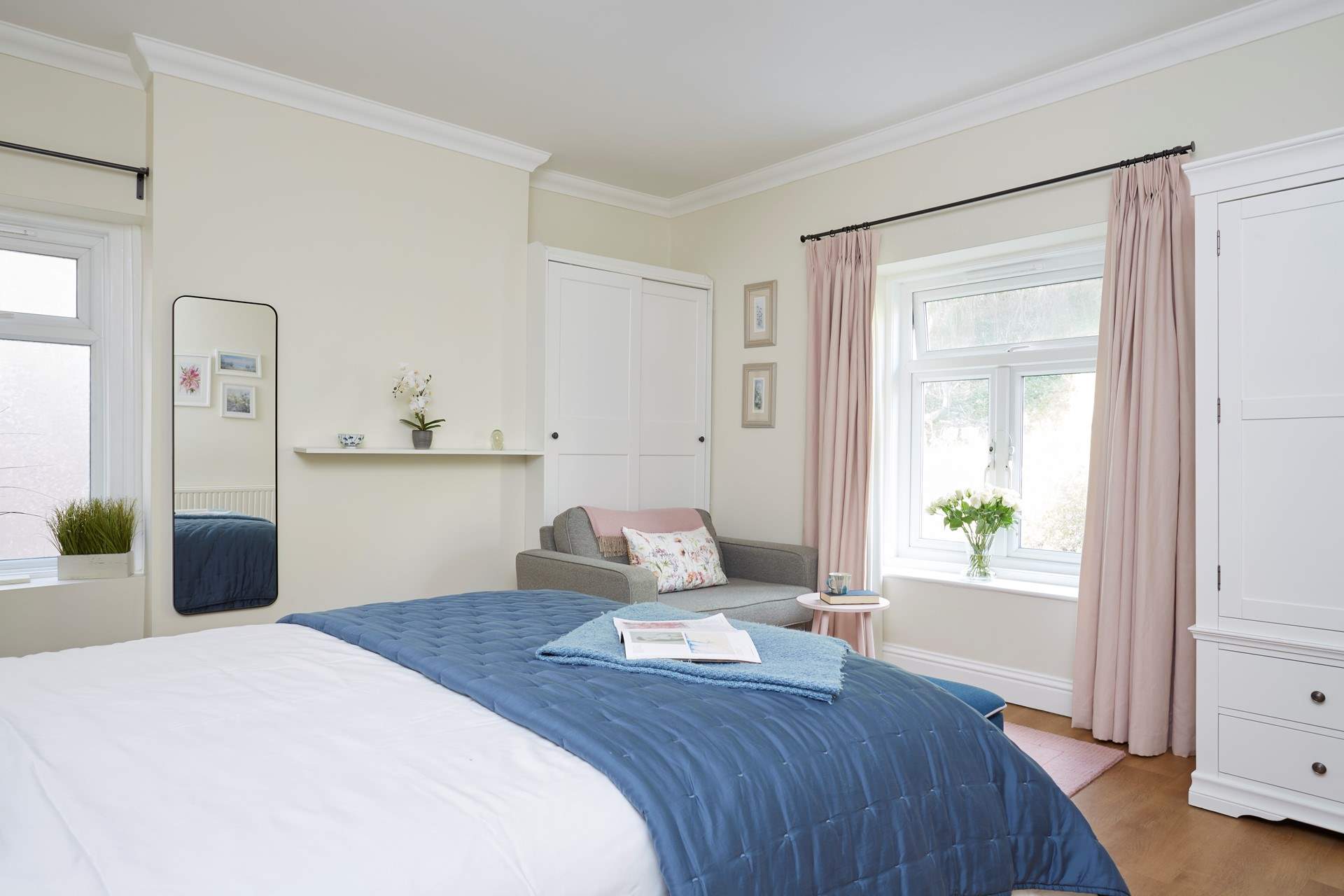 The bedroom showcases lovely decor. 