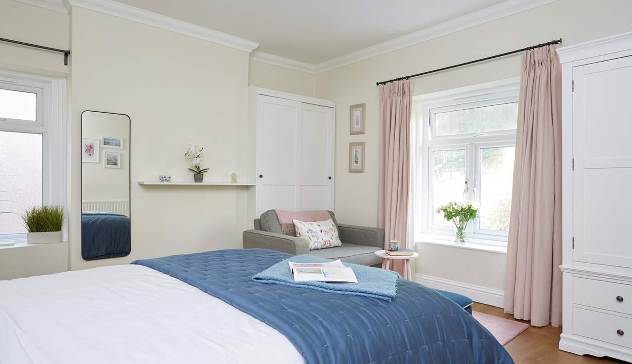 The bedroom showcases lovely decor. 