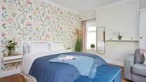 The bedroom is bright and spacious.