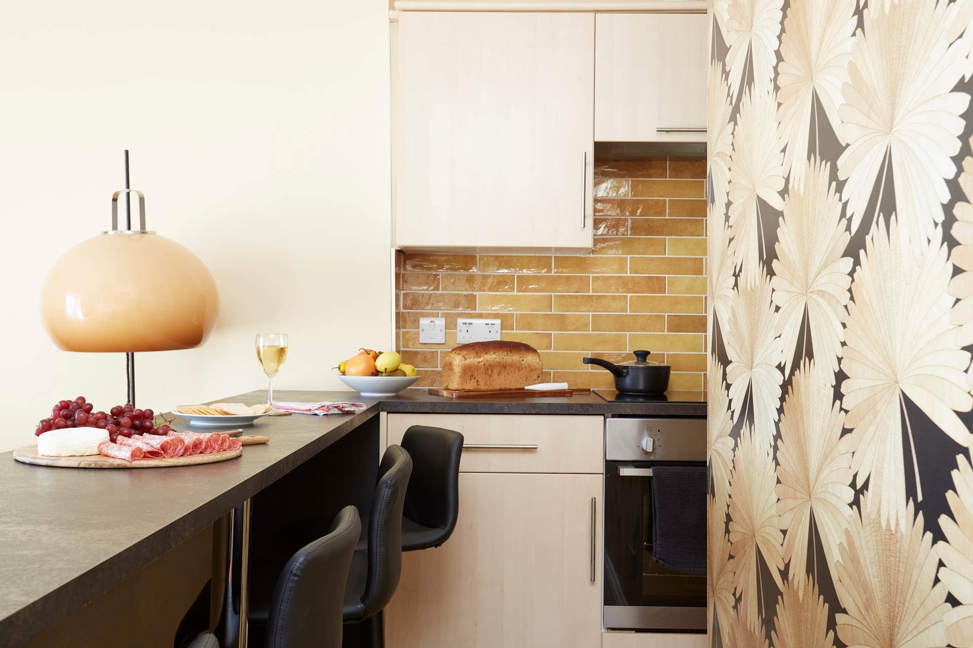 Enjoy a glass of wine and a charcuterie board after a day on the beach.