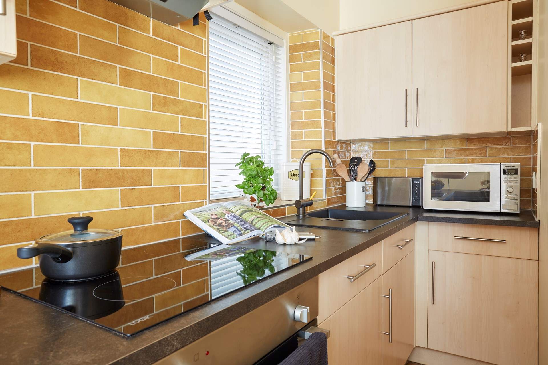 All the modern appliances to help prepare a meal. 