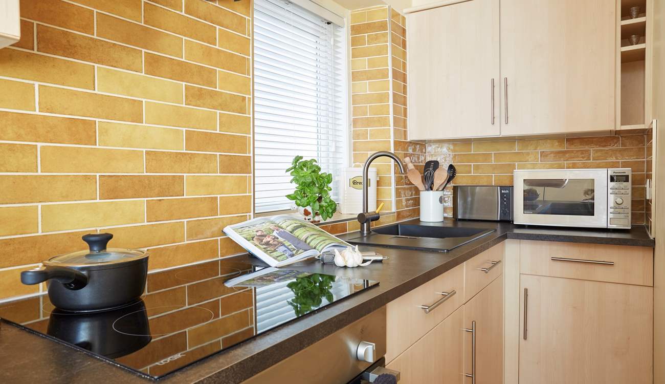 All the modern appliances to help prepare a meal. 