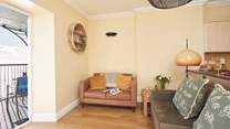 The comfortable living area with views of the sea.