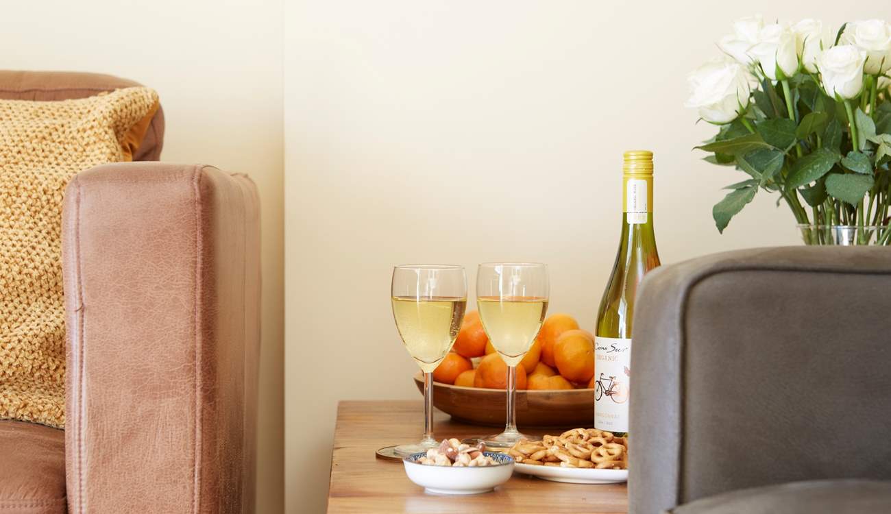 Wine, nibbles and the sound of the sea.