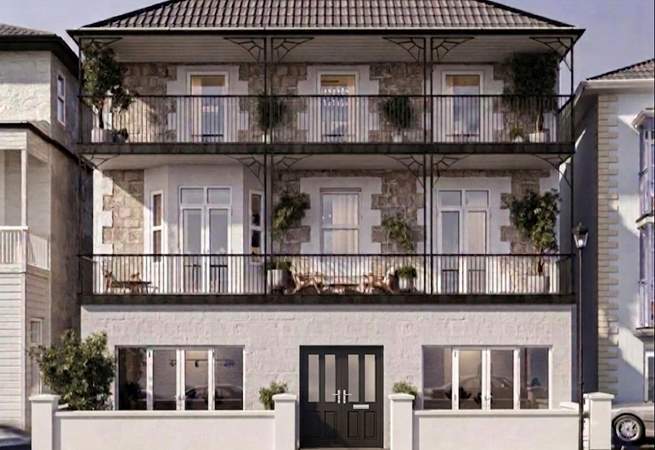 Oceanix is the top apartment on the left of the second floor. Please note there are four flights of stairs to the apartment. 
