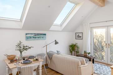 The open plan living area is a lovely space to sit back and relax.