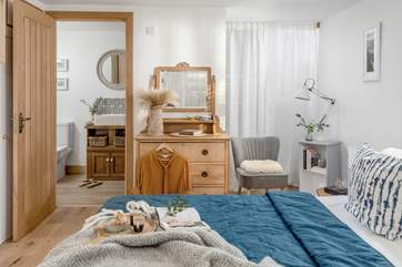 The bedroom is a dreamy place to relax.