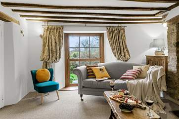 The lovely furnishings complement the delightful countryside setting.