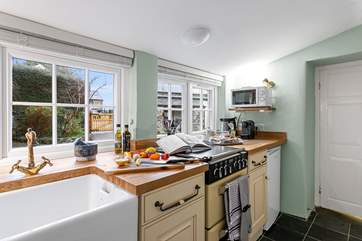 The galley kitchen is light and bright thanks to the double windows.