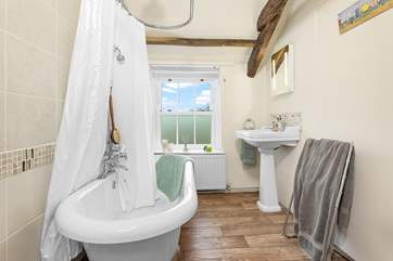 A glorious roll-top bath to soak in after a day of adventure.