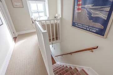 The staircase to the first floor bedrooms and bathroom.