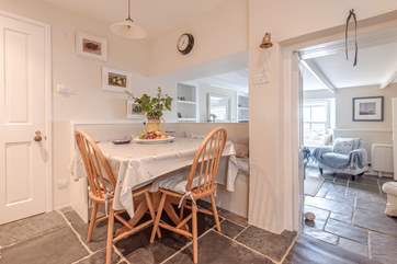 The kitchen links to the sitting-area.
