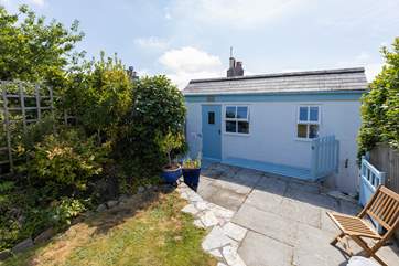 The small rear garden is beautifully secluded.