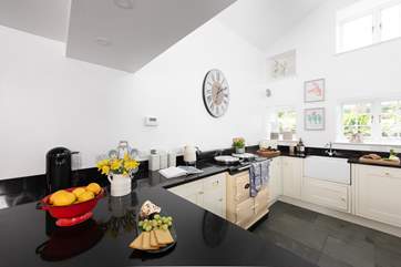 The double height kitchen is a wonderfully light and airy room