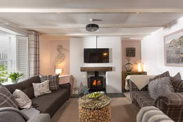 Snuggle up in front of the wood-burner on chillier nights.