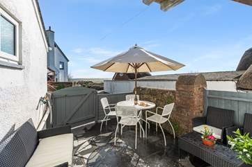 The pretty courtyard is the perfect place for holiday meals or just relaxing with a good book.