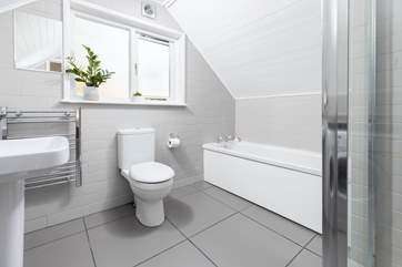 The sleek bathroom for a relaxing soak after a day out and about.