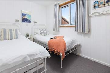 One of two twin bedrooms with three-foot beds, perfect for either adults or children.