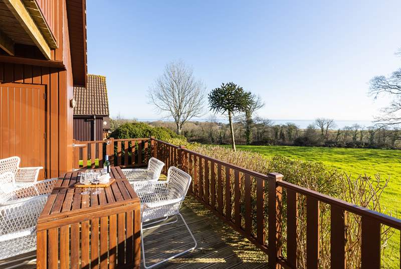Take in the lovely view from the deck and enjoy al fresco dining at its best.