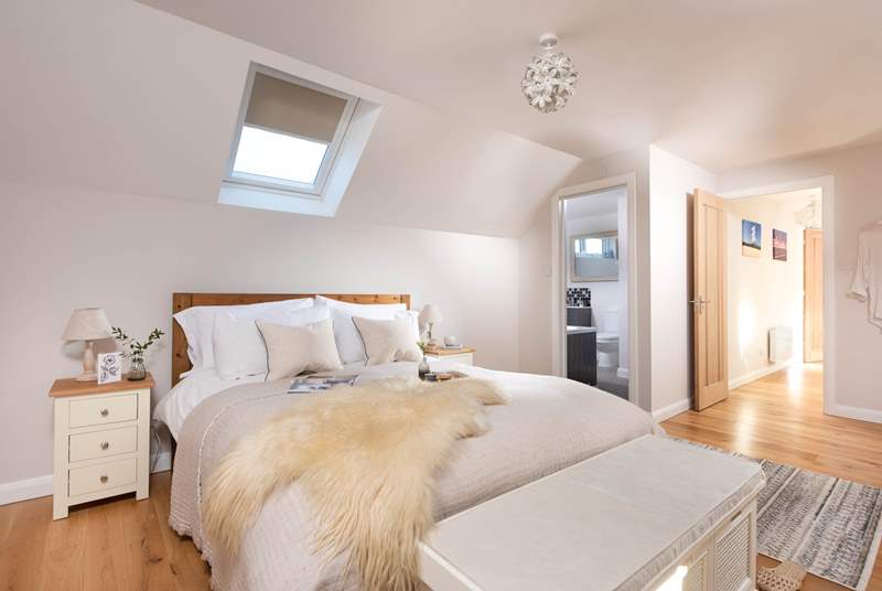 Bedroom Three has a sumptuous king-size bed and a fabulous en suite bathroom.