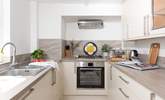 Small but perfectly formed, the kitchen is light and bright. - Thumbnail Image