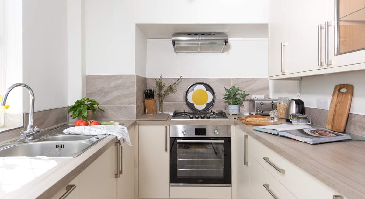 Small but perfectly formed, the kitchen is light and bright.